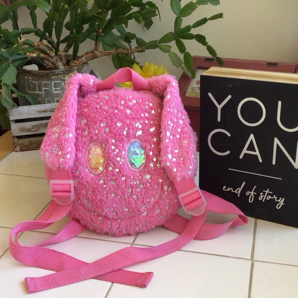‘Angel Face’ Pink Plush Glittery Backpack